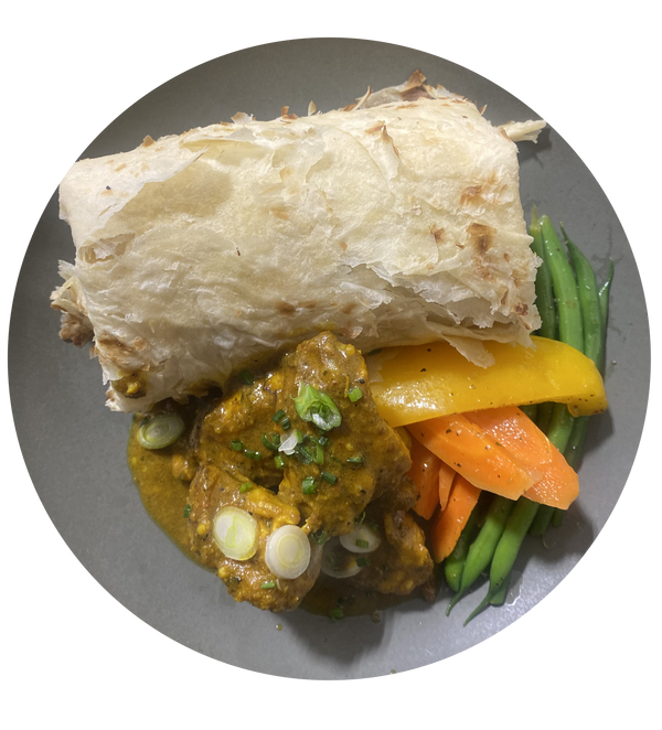 Boneless Curry Chicken with Roti and Vegetables