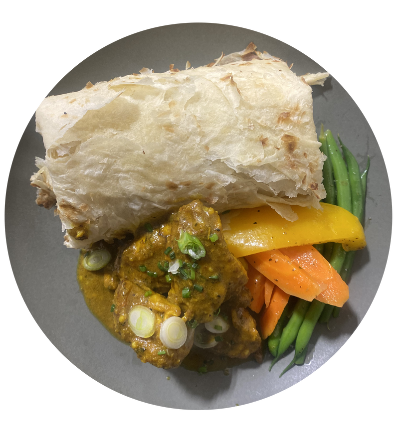 Boneless Curry Chicken with Roti and Vegetables