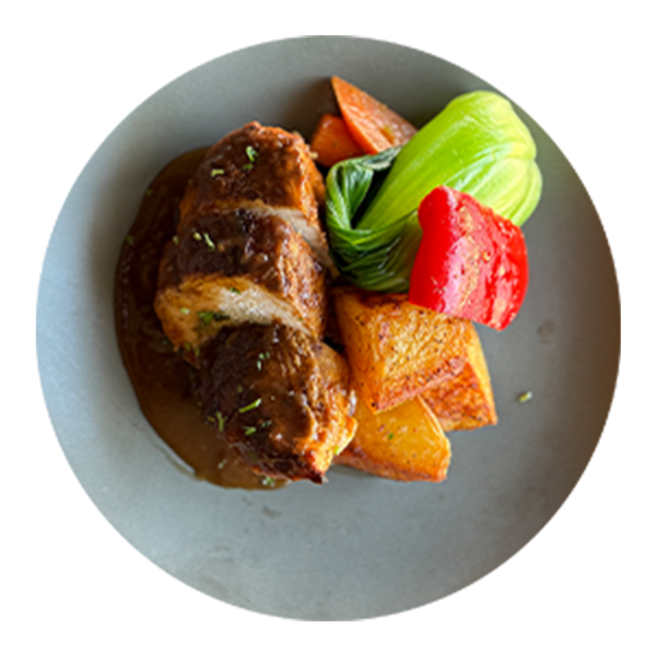 Stuffed Chicken Breast with Spinach Sun-dried Tomato Havarti Cheese and Gravy with Roast Potatoes and Market Vegetables